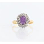 A hallmarked 18ct yellow gold amethyst and diamond ring, ring size O½, approx. weight 3.5g.