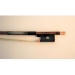 A C.A. Hoyer gold metal mounted violin bow, stamped to end, with pearl and gold metal details to