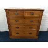 An Edwardian satinwood chest of three long and two short drawers. IMPORTANT: Online viewing and