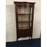 An Edwardian mahogany bow front single door display cabinet, height approx. 170cm IMPORTANT: