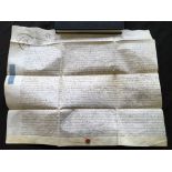 Indenture dated 1717 with a strip of three 6d revenue stamps. IMPORTANT: Online viewing and