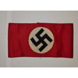 A World War Two Swastika on white background stitched onto red felt armband. IMPORTANT: Online