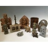 A collection of various wood and soapstone Hindu carvings, together with various other items to