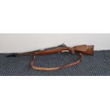 A Weihrauch 22 air rifle in blue carry case. IMPORTANT: Online viewing and bidding only.