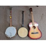 Two various banjos, one in case, with a Spanish guitar, in case. IMPORTANT: Online viewing and