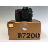 A Nikon D7200 camera, without lens, in box. IMPORTANT: Online viewing and bidding only. Collection