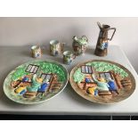 A selection of Burslem H. J. Wood items to include two large wall chargers, three tankards, a