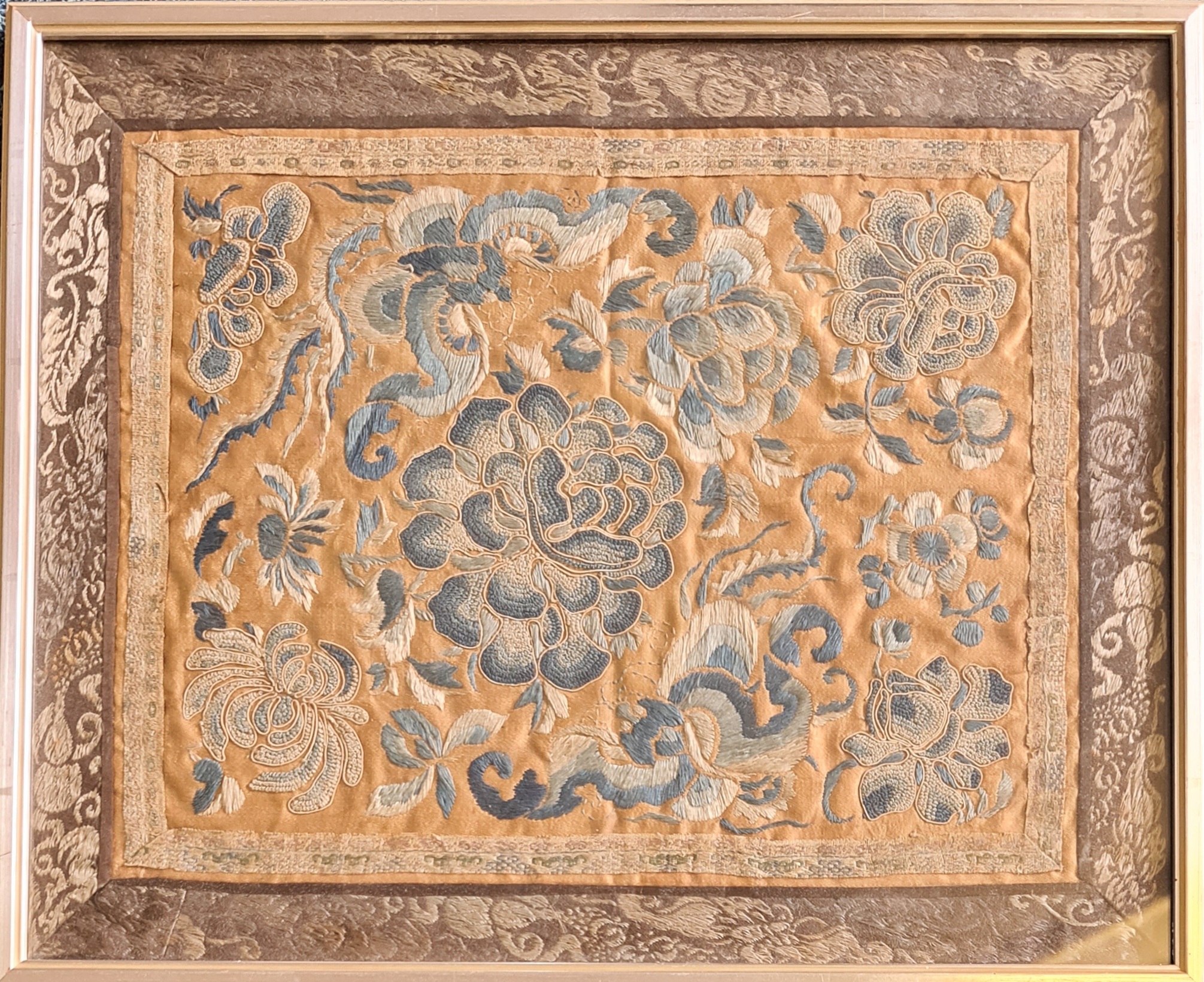 A framed kimono panel with blue floral design, together with a watercolour and ink on cloth, river