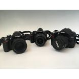 Three Nikon cameras, D80, D3000 and D3200. IMPORTANT: Online viewing and bidding only. Collection by