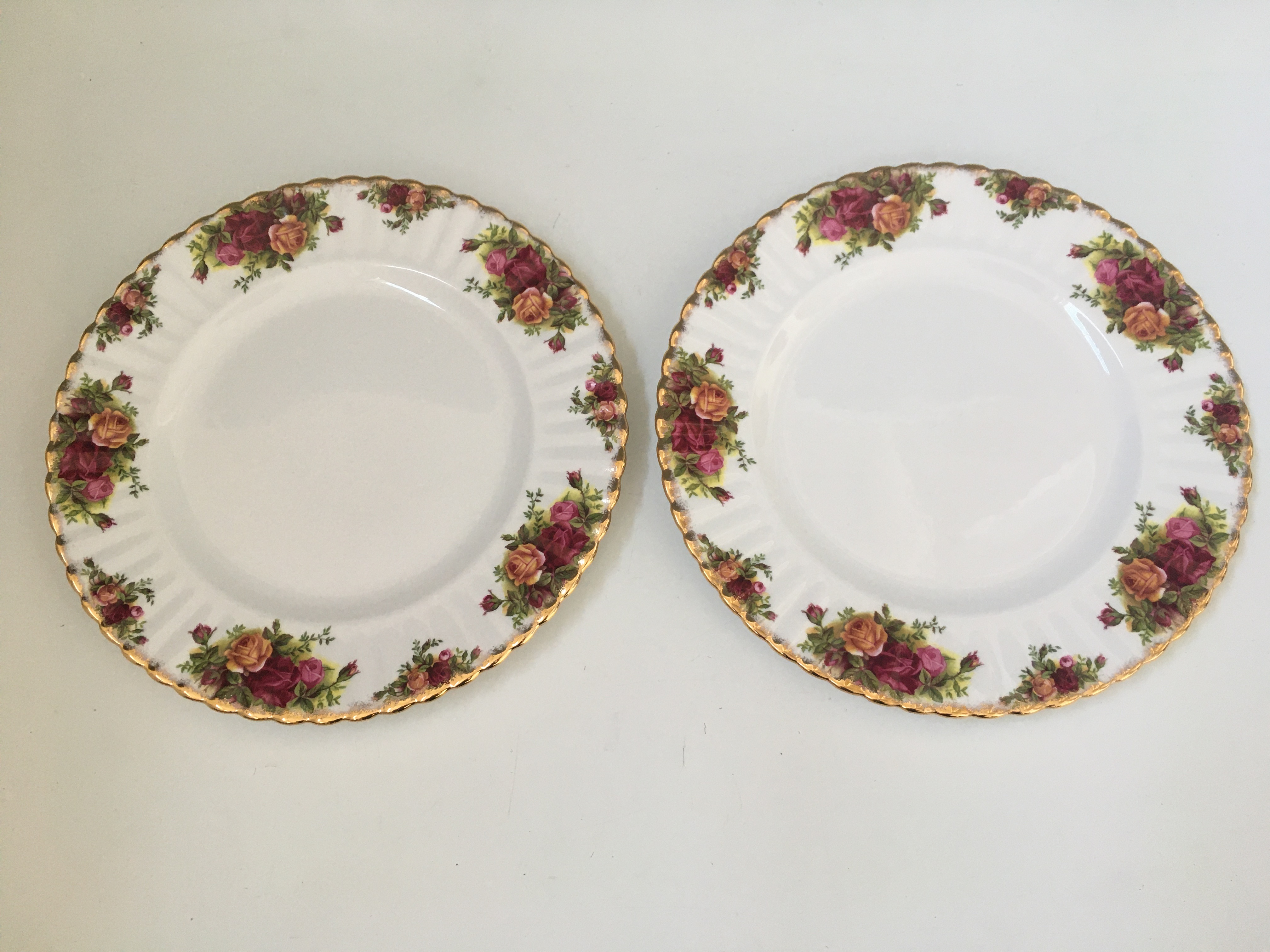 *Eight Royal Albert Old Country Roses plates, two are seconds. IMPORTANT: Online viewing and bidding