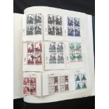 An extensive five volume foreign collection of used stamps, plus a stock book of Switzerland.