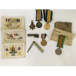 A collection of World War One items to include War, Victory and 1914-15 Star medals awarded to 64736