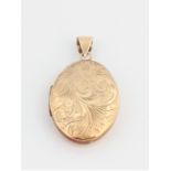 A hallmarked 9ct yellow gold oval decorative locket, approx. weight 11.6g. IMPORTANT: Online viewing