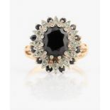 A hallmarked 9ct yellow gold sapphire and diamond cluster ring, ring size P½, weight approx. 5.5g.