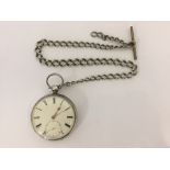 *A Victorian hallmarked silver key wind open face pocket watch, the white enamel dial having hourly