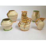 Five Crown Ducal vases and a jug in Pussy Willow Orange, Green and Crocus patterns. IMPORTANT: