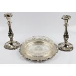 A pair of silver plated scrolling design candlesticks, height approx. 26cm, together with a silver