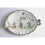 An 18th century Worcester Chinese Musicians pattern leaf form plate decorated with oriental style