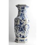 A large Chinese blue and white vase decorated with figures parading, with character marks to base '