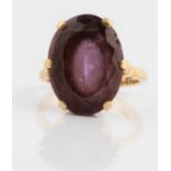 An amethyst dress ring, set with an oval cut amethyst measuring approx. 18x14mm, stamped 9ct,