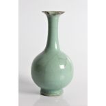 A 19th century Chinese green vase, cracked to top rim, approx. height 23.5cm. IMPORTANT: Online