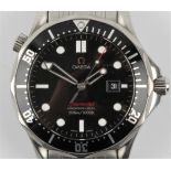 A gents Omega Seamaster Professional quartz wrist watch, the black dial having quarterly baton