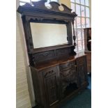 An oak Edwardian mirrored back sideboard fitted with two drawers and two doors to base. IMPORTANT: