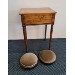 A Victorian two drawer side table on turned columns with two Victorian round footstools.