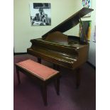 A Herrburger Brooks mahogany baby grand piano with a duet stool. IMPORTANT: Online viewing and