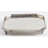 A silver card tray, of octagonal form with raised pierced edge on four feet, personal inscription to