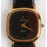 A ladies Concord quartz wristwatch, black dial on black leather strap, stamped 750 18k on case, in