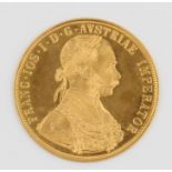 A 1915 Austrian 4 Ducat gold coin. IMPORTANT: Online viewing and bidding only. No in person