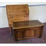 An oak bureau together with an oak linen fold front blanket box. IMPORTANT: Online viewing and