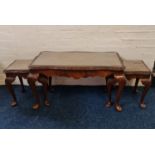 A walnut nest of three coffee table with glass top. IMPORTANT: Online viewing and bidding only.