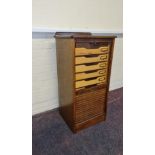 An oak tambour front office cabinet with key. IMPORTANT: Online viewing and bidding only. Collection