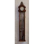 An Admiral Fitzroys Barometer, wall hanging and topped with clock, height 121cm. IMPORTANT: Online