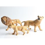 A pride of three Beswick lions. IMPORTANT: Online viewing and bidding only. Collection by