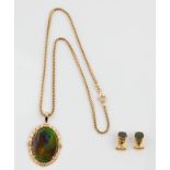 A collection of ammolite jewellery, to include an ammolite triplet pendant, stamped 14k, on a