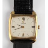 A ladies OMEGA DE VILLE gold plated wristwatch, the champagne dial having quarterly Roman numerals