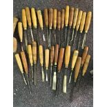 A selection of various wood turning chisels. IMPORTANT: Online viewing and bidding only.