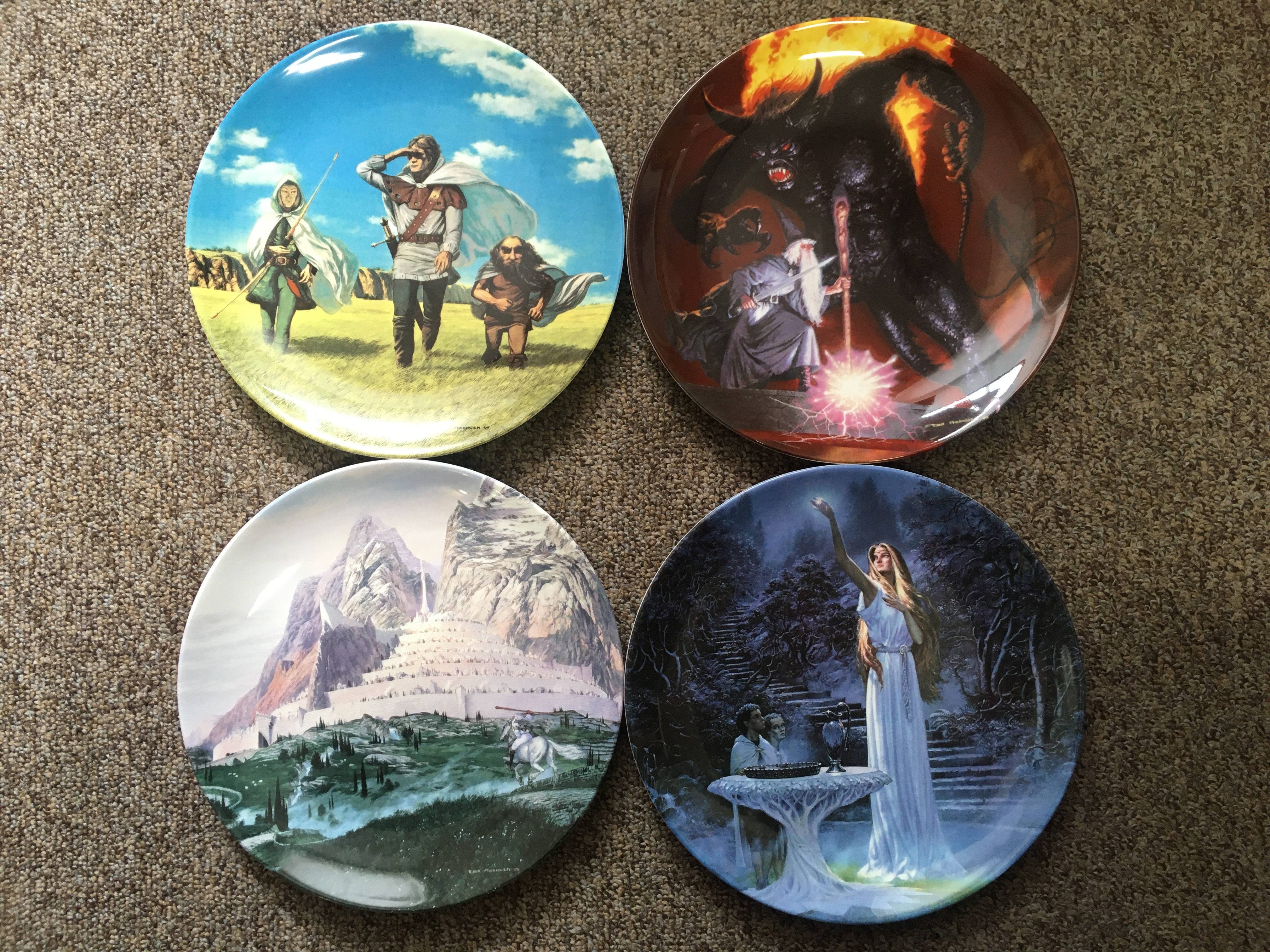 A set of twelve Danbury Mint Lord of the Rings wall plates. IMPORTANT: Online viewing and bidding