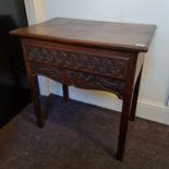 A 19th century oak carved front single draw lowboy IMPORTANT: Online viewing and bidding only.