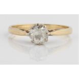 A hallmarked 9ct yellow gold diamond solitaire ring, set with an old cut diamond measuring approx.