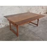 A mid 20th century Danish rosewood draw leaf coffee table, ‘Made in Denmark HM’ to base, 52cm x