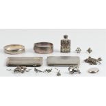 A collection of hallmarked silverware, to include a cigarette case, two hinged bangles and a locket,