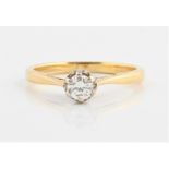 A hallmarked 18ct yellow gold diamond solitaire ring, set with a round brilliant cut diamond,