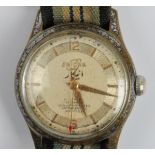A gents ENICAR wrist watch, the gold-tone dial having hourly baton markers with 12 and 6 o'clock