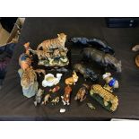 A selection of various animal figurines to include Goebel dog, Juliana Collection tiger family,