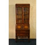 An oak two draw bureau book case with glazed top IMPORTANT: Online viewing and bidding only.