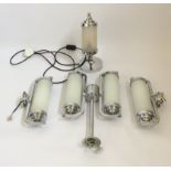 A chrome Art Deco style ceiling light fitting with cylinder frosted shades together with a pair of